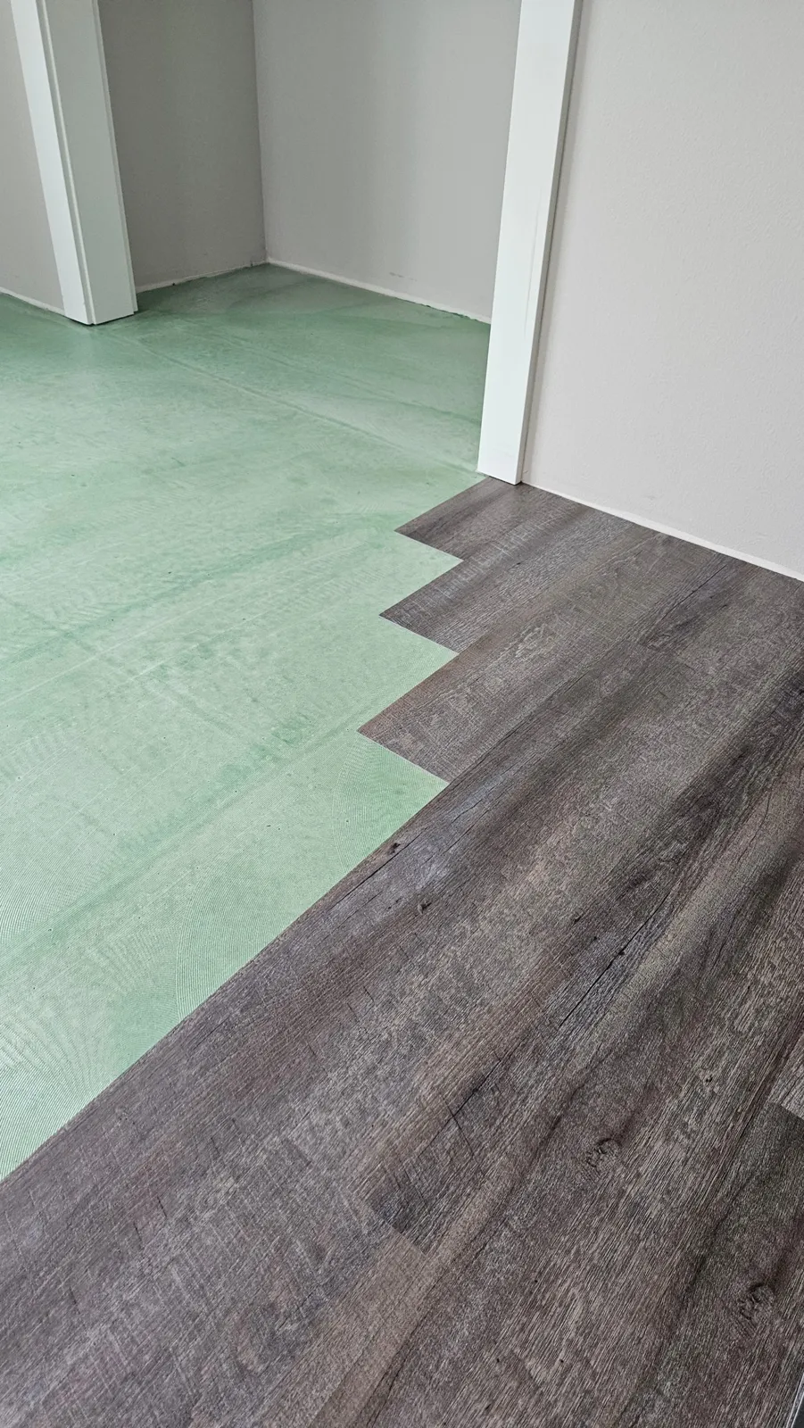 Vinyl plank flooring installed over a prepared, leveled subfloor