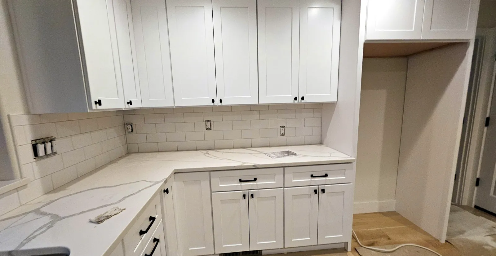 White shaker kitchen remodel by Ursus Construction