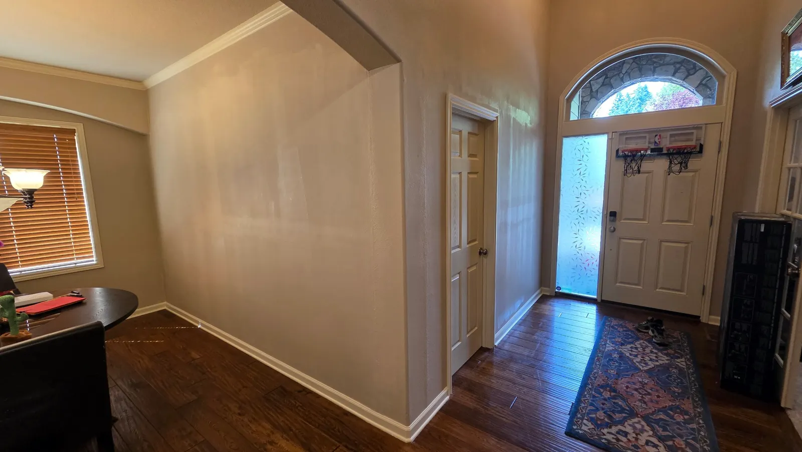 After: open archway closed in with a new framed wall